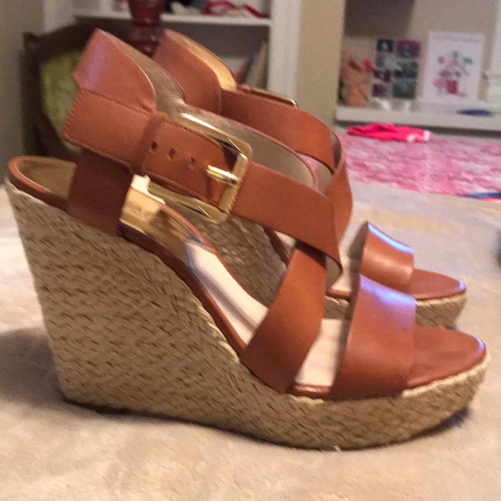 Leather Michael Kors 4 inch wedge heels.